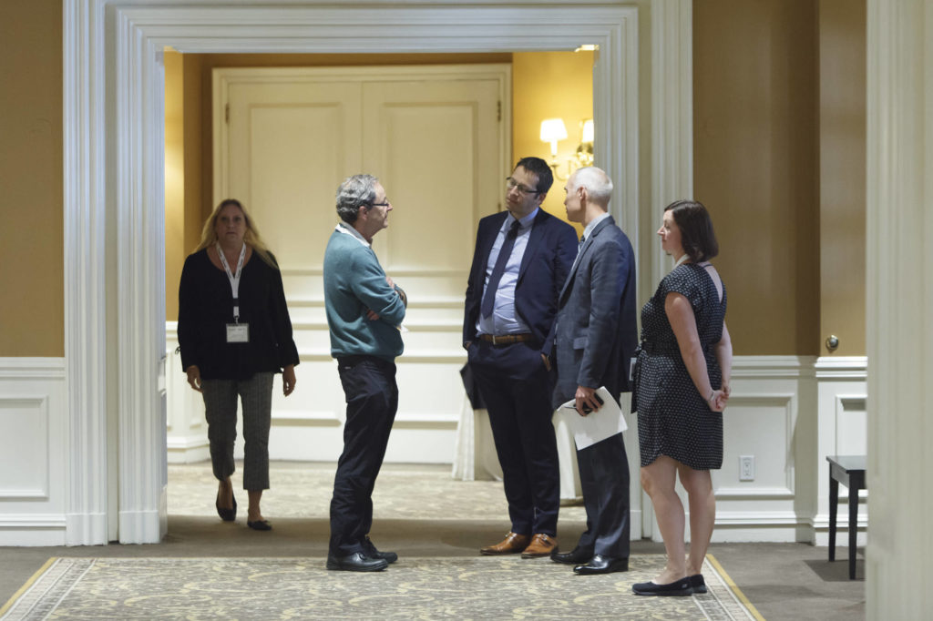 Boskalis on the move participants speak in the hallway