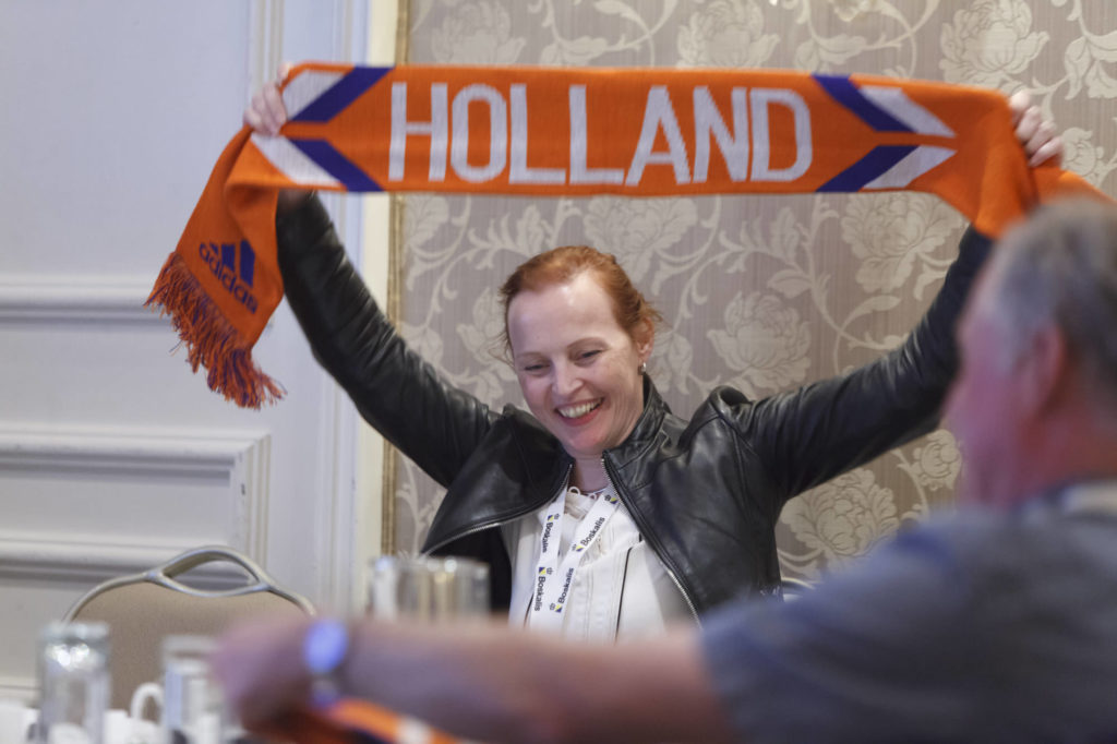 holding up a Holland scarf