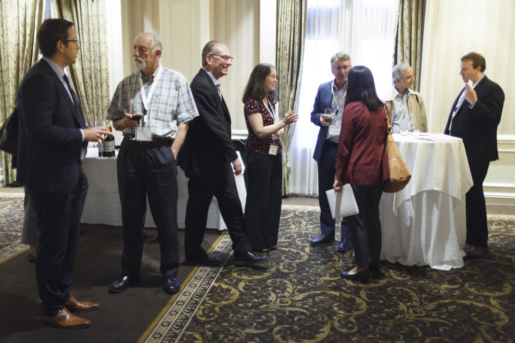 candid event photography during networking break