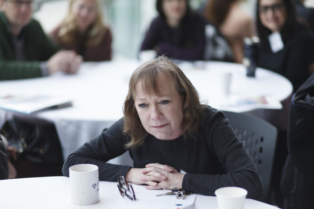 roundtable discussion moderator closeup