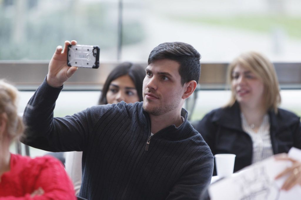 taking photos with their smartphone