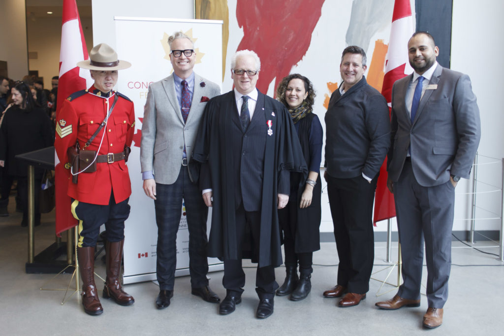 group photo of participants with platform party