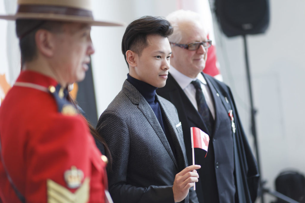 holding the canada flag