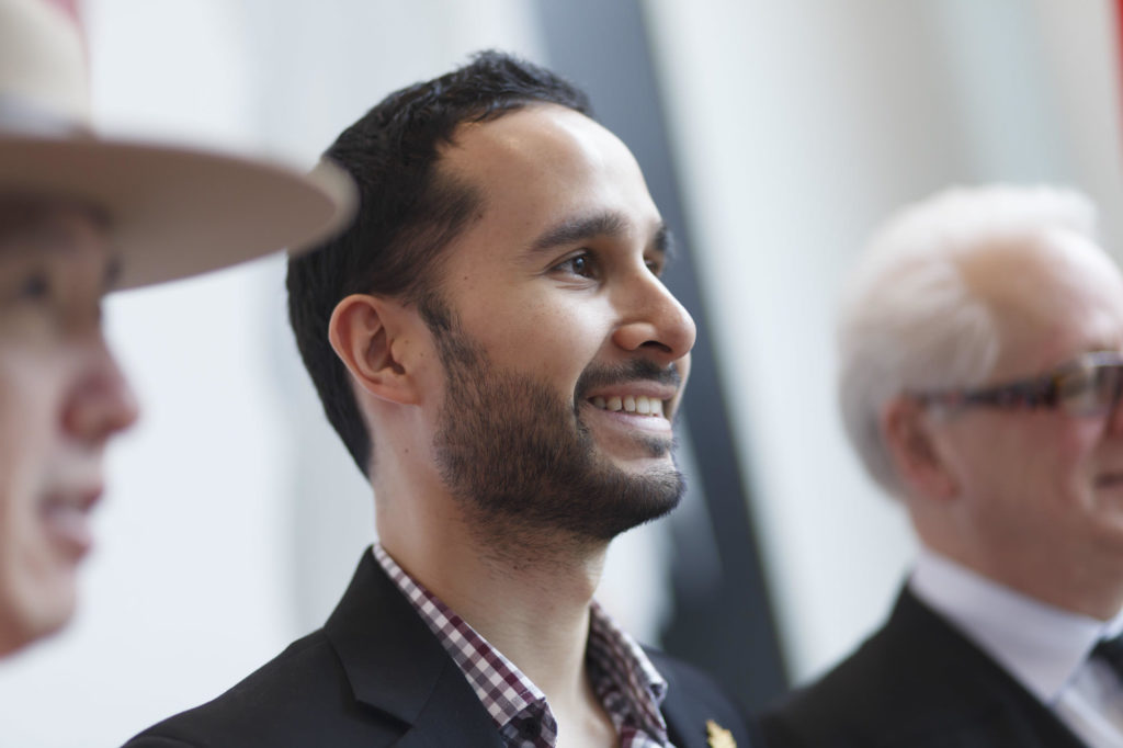 participants pose for group photos