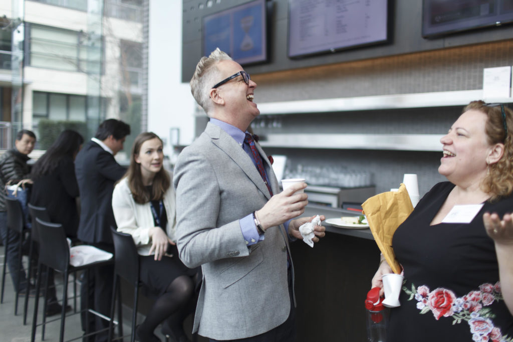 candid photo of networking following the event