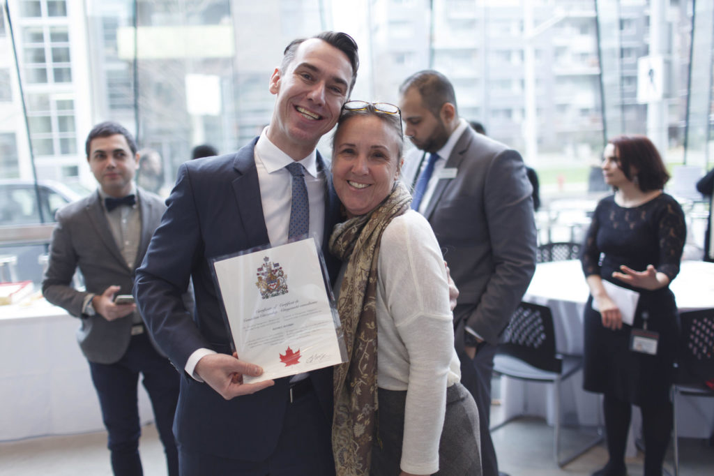 posing photography with citizenship certificate