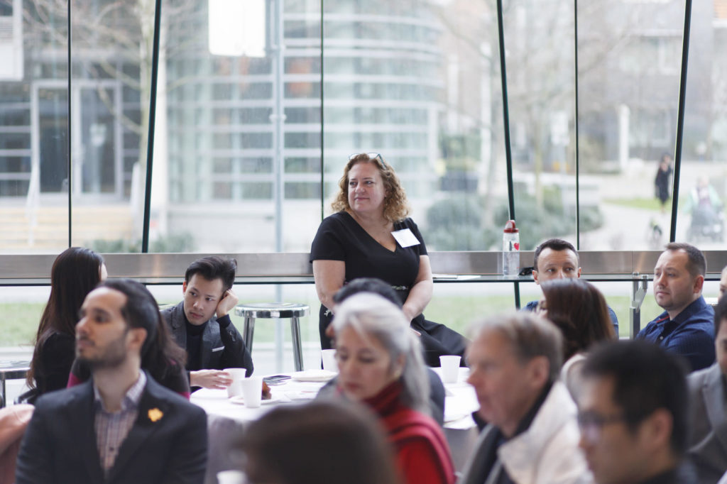 roundtable moderator listens to ICC staff