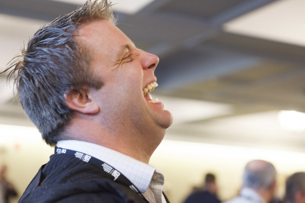 candid laugh during the networking break