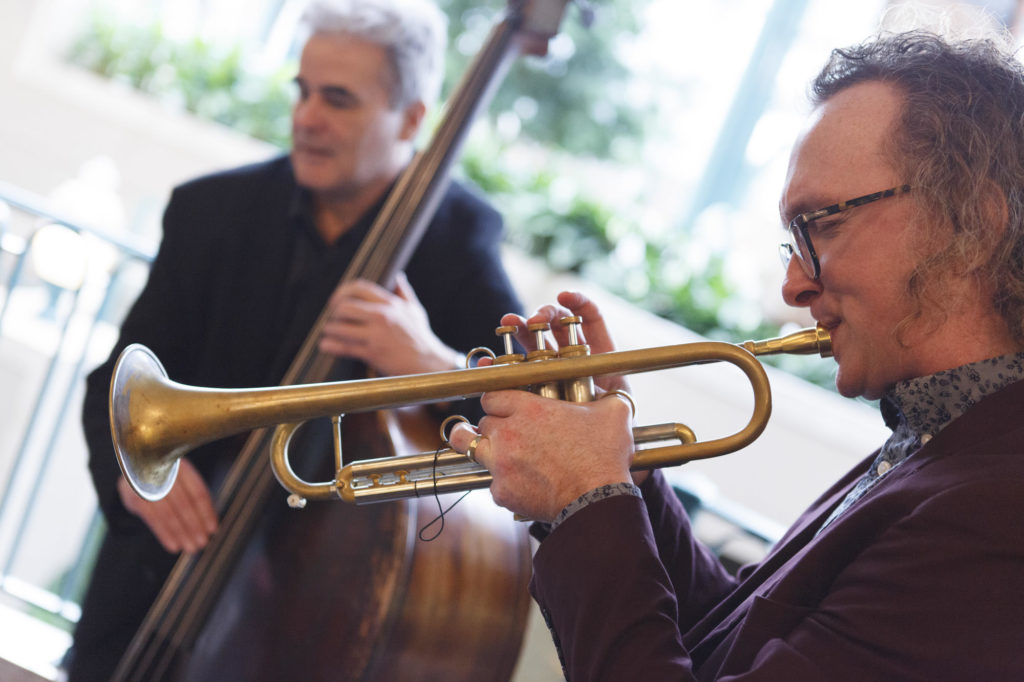 A band plays during the event networking break