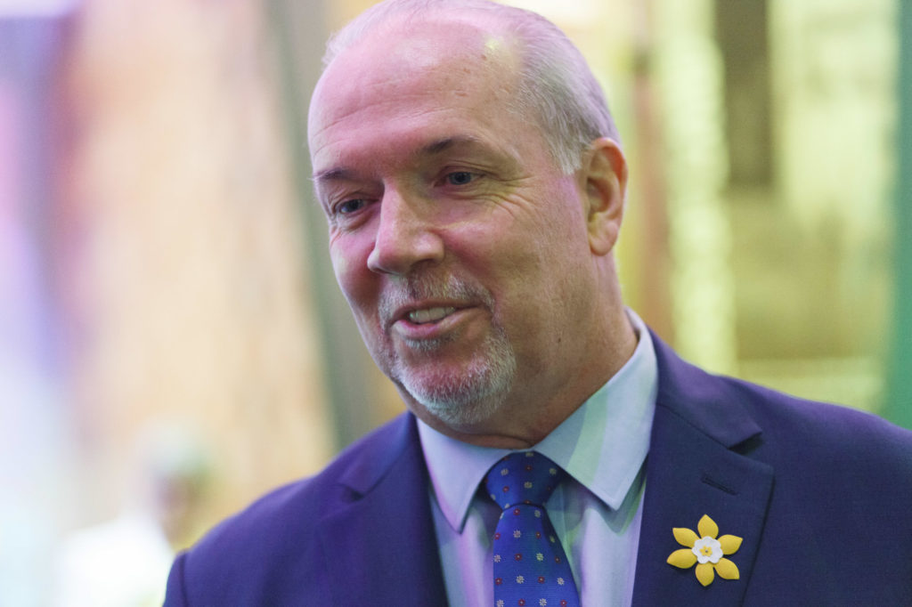 BC Premier John Horgan speaks with participants