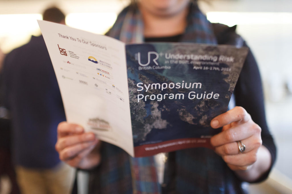 close up photo of the symposium program guide
