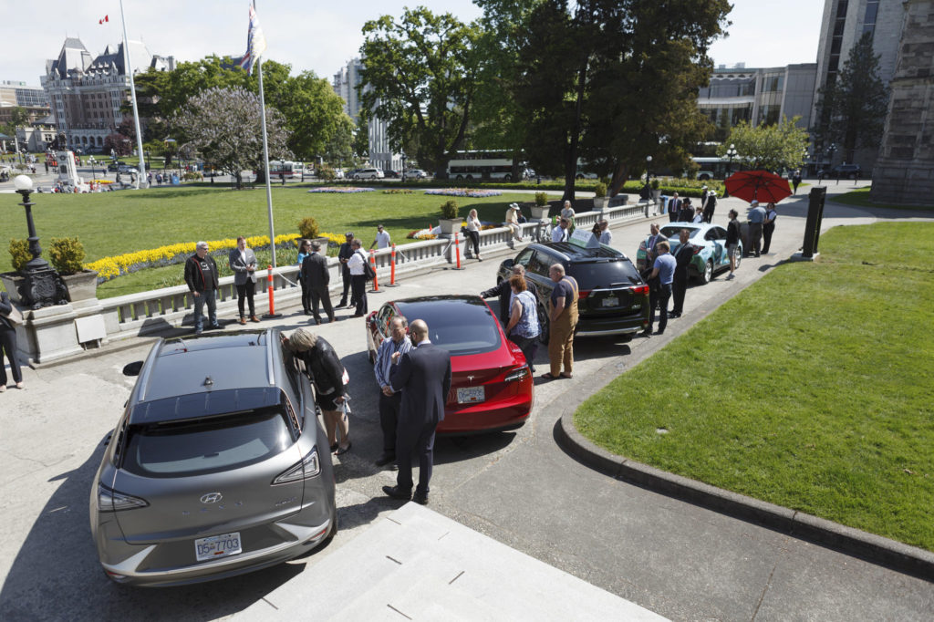 photography of hydrogen cars at victoria legislature