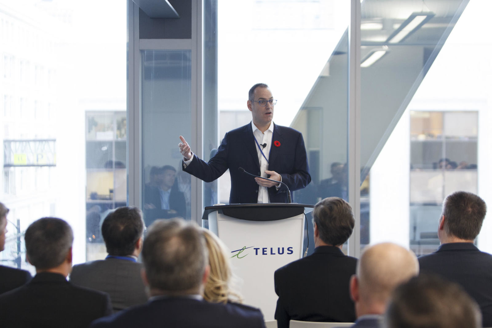MC speaks at the Identity North Conference at Telus Garden.
