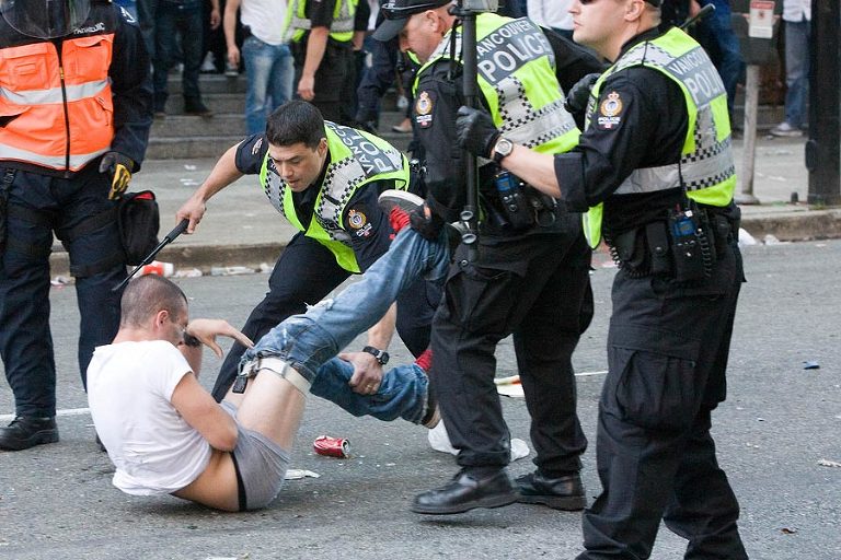Police subdue a man during the Stanley Cup Riots
