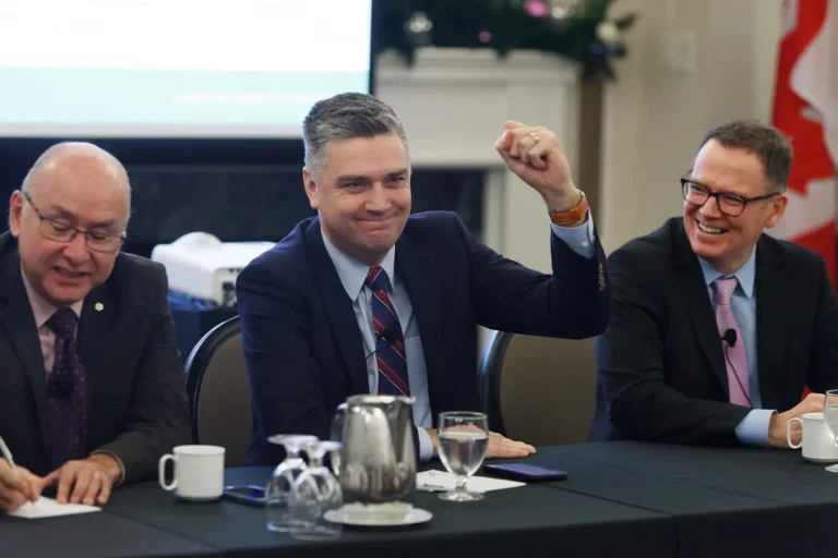 members of the B.C. Conservative caucus joke during a lobbying meeting in Victoria BC