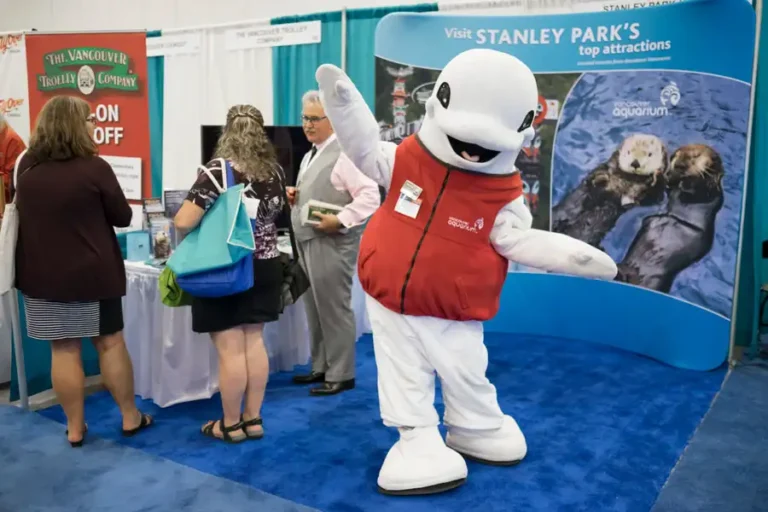 CLIA360 cruise conference tradeshow with Vancouver Aquarium beluga mascot — Victoria event photographer coverage.