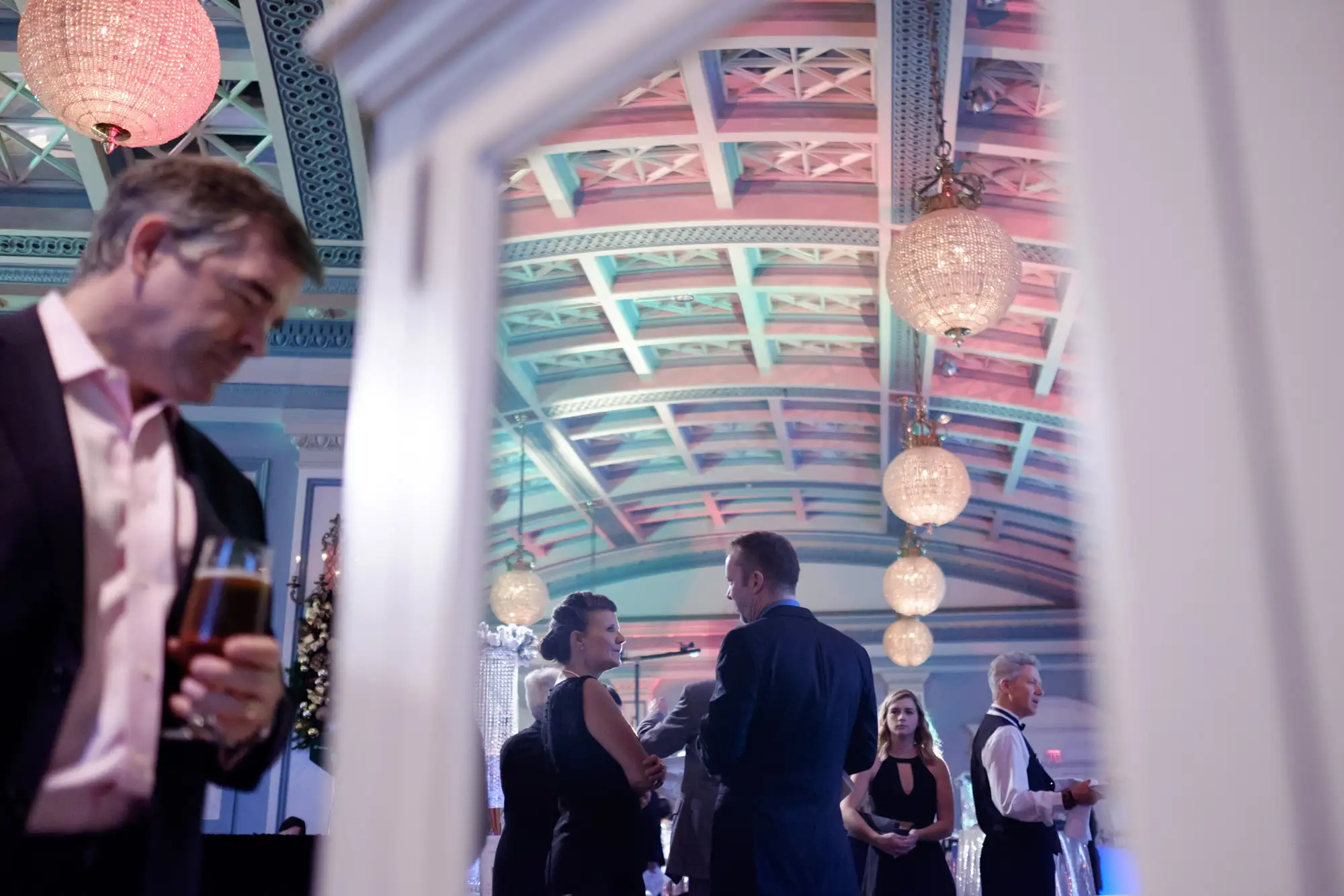 attendees at the bc cancer jingle mingle network during a fundraising auction event