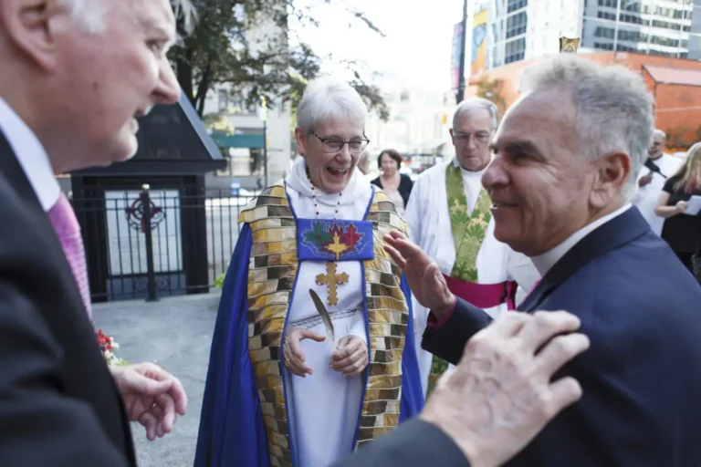 Anglican Church General Synod delegates arriving at Christ Church Cathedral in Vancouver, photographed at the event