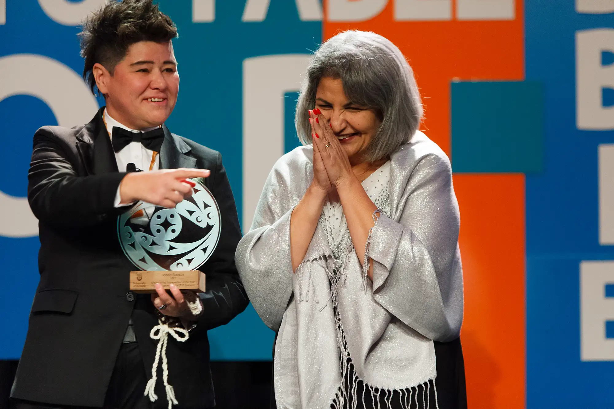 DEYA winner accepts their award during celebrations at the Victoria conference centre