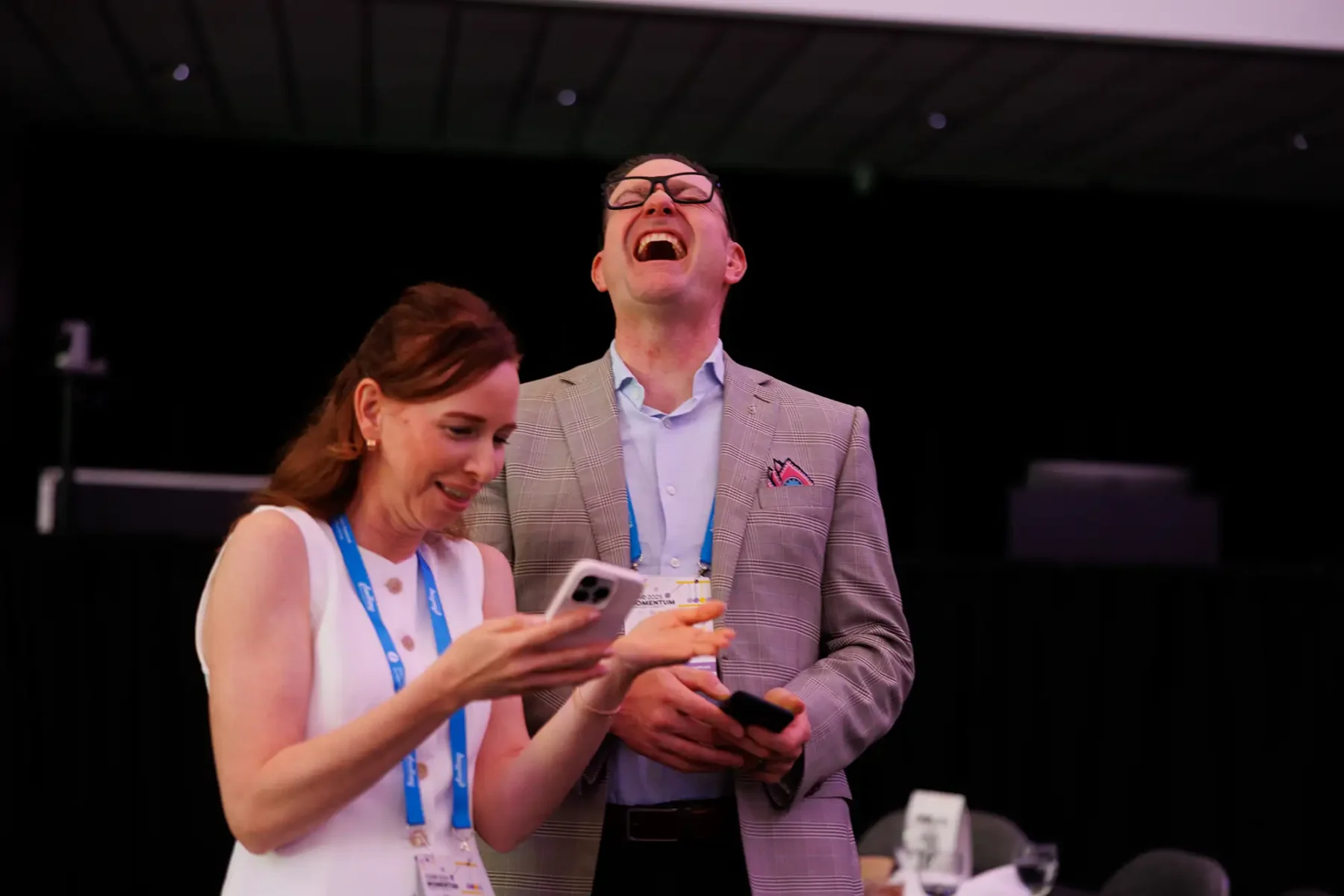 conference attendees laugh during a networking break at the CSAE conference in Victoria BC