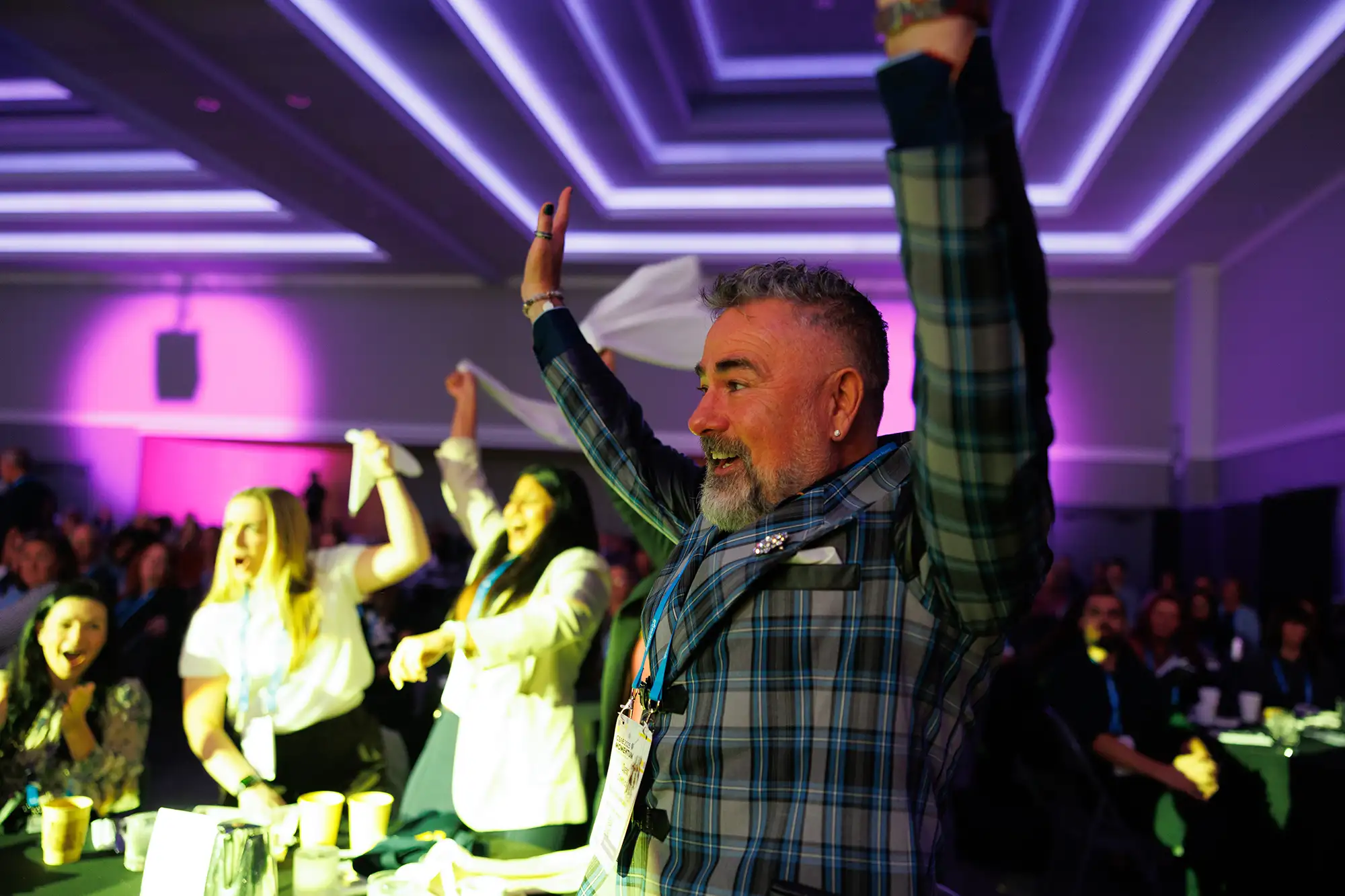 audience members celebrate during the CSAE annual conference at the Victoria Conference Centre.