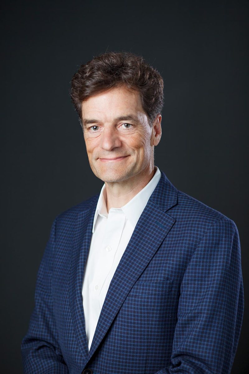 Headshots in Victoria of an executive on a black backdrop