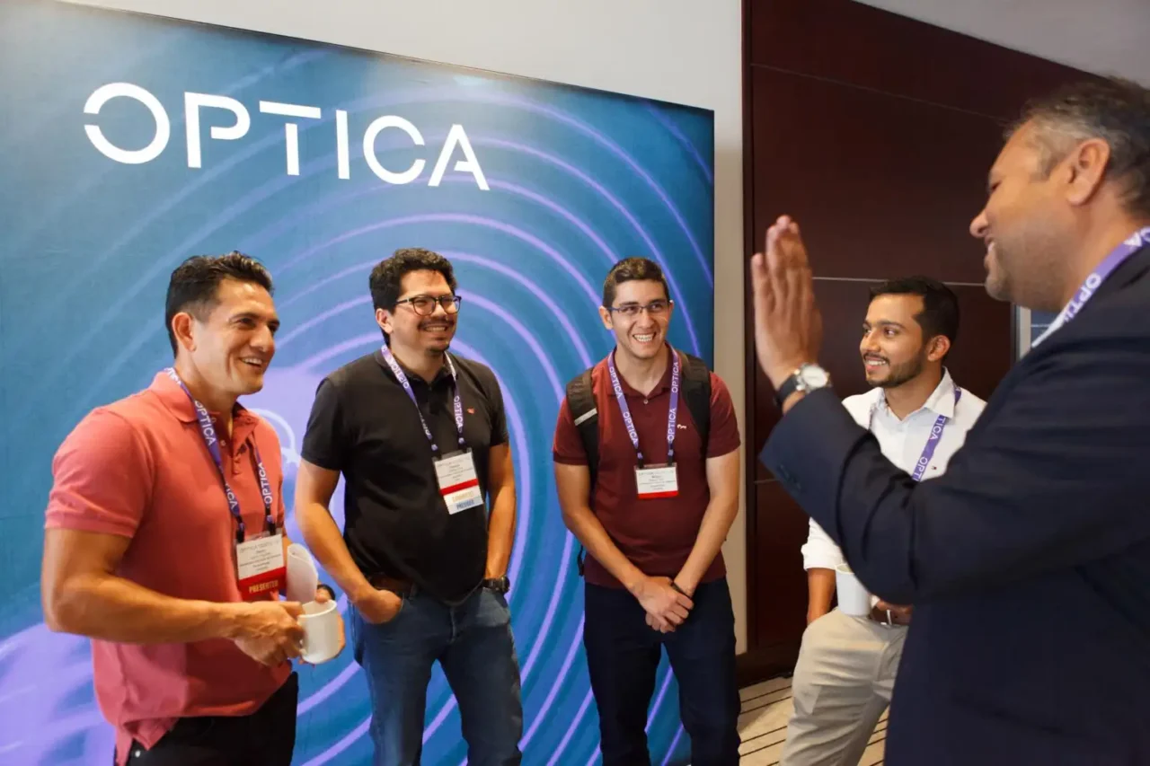 Four attendees at the Optica Congress in Vancouver BC, example of Victoria event photographer coverage
