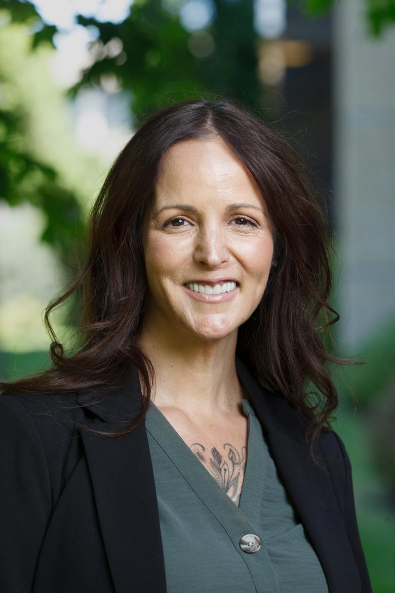 Victoria BC headshot of a woman outside at UVic