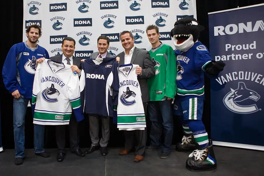 corporate event photography in Victoria BC: coverage of a Vancouver Canucks and Rona partnership announcement