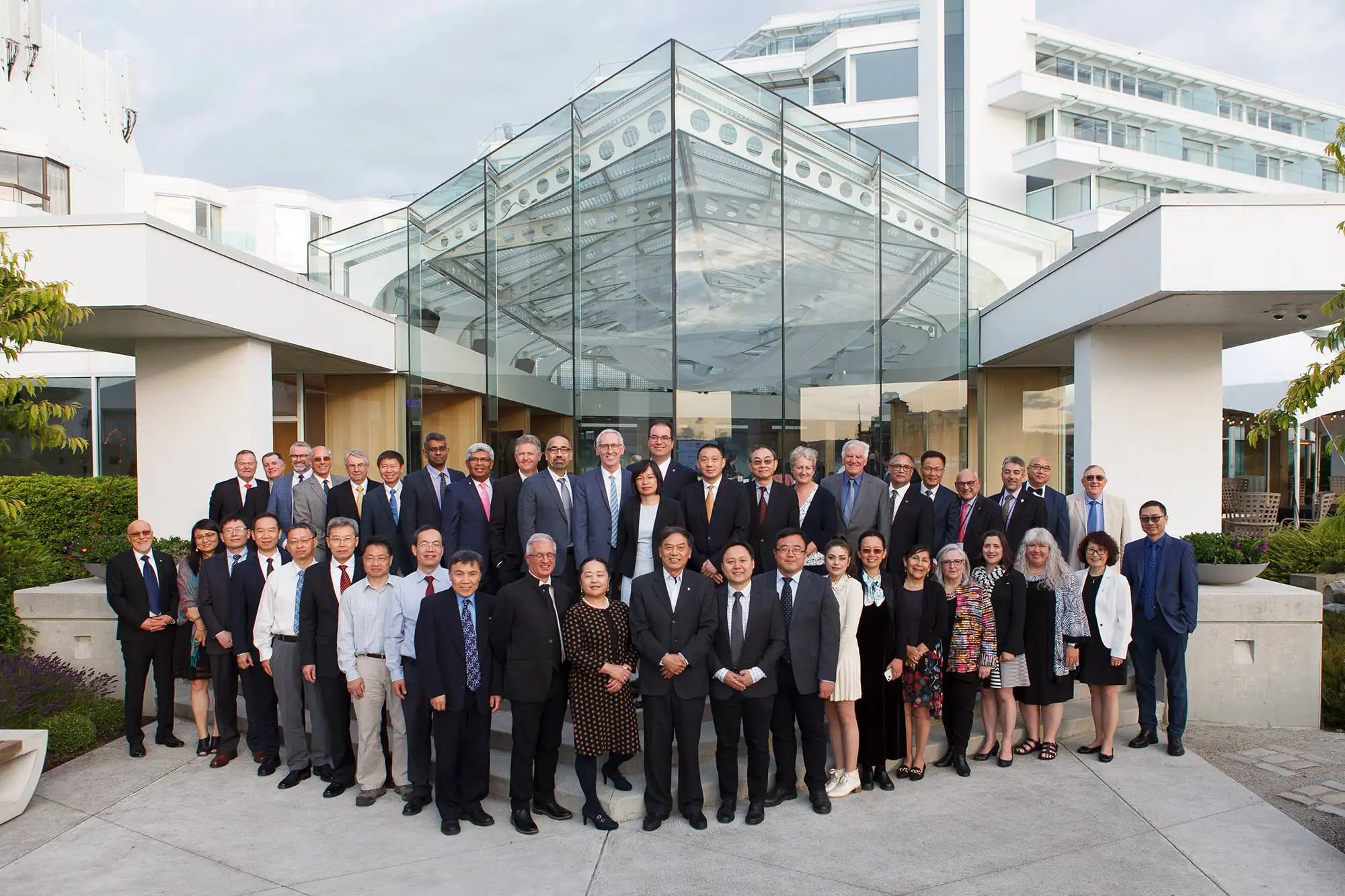 Group photo of engineering fellows, captured by a Victoria headshot photographer at the Laurel Point Inn